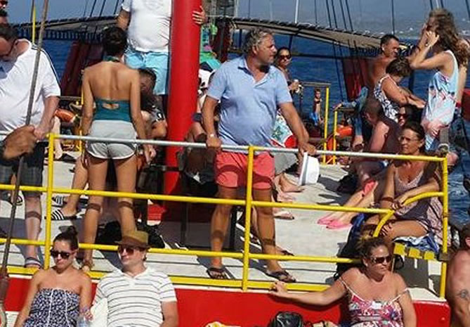 Traditional pirate ship sailing along the Cretan coastline